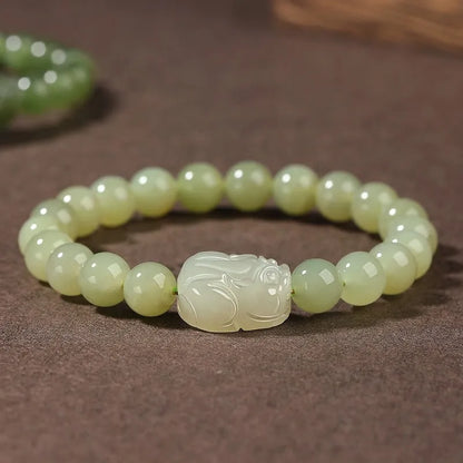 Women's polished Hetian jade ethnic bracelet showing 6mm, 8mm, and 10mm bead size options.