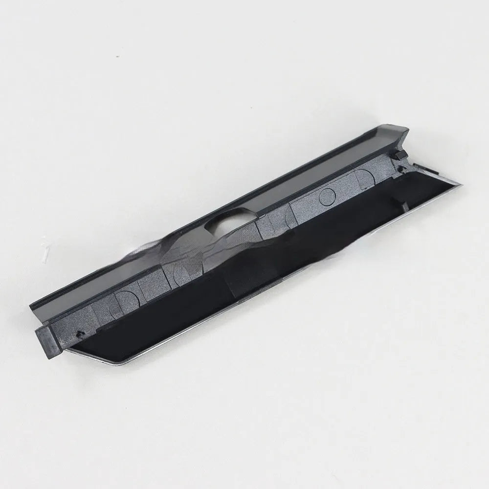 Black and white plastic hard drive PCB cover for 3.5-inch drives, shown from above.