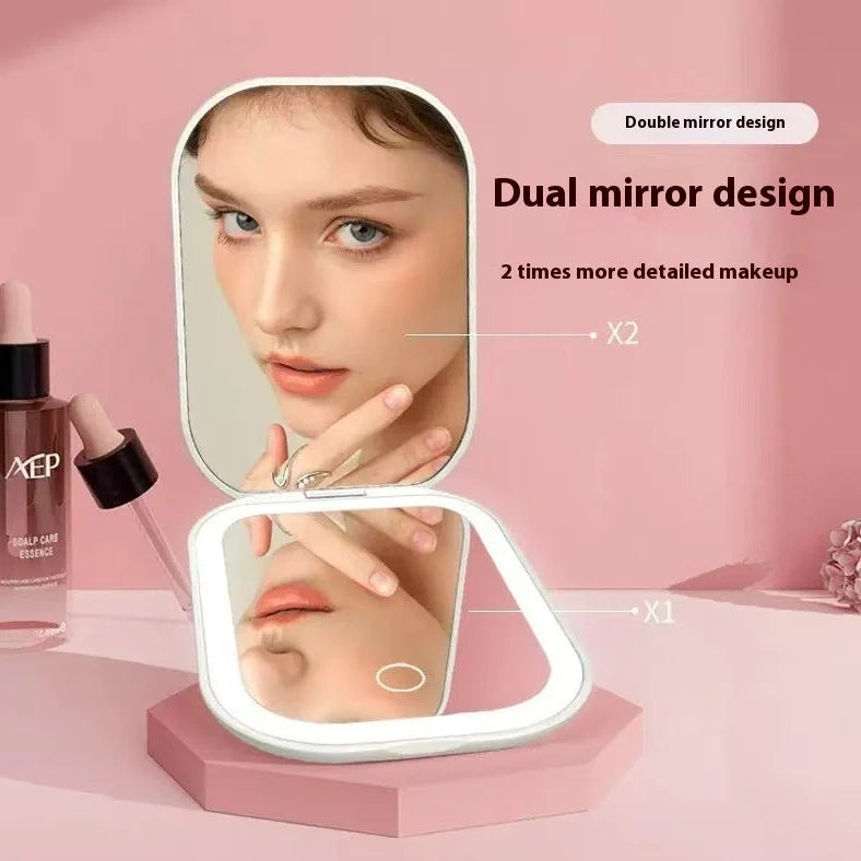 White foldable cosmetic mirror with LED lights showing 10.4x7.5cm glass lens and 105x75mm frame