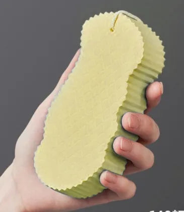 3D fish scale pattern bath sponge in white, grey, pink, or light blue for gentle exfoliation