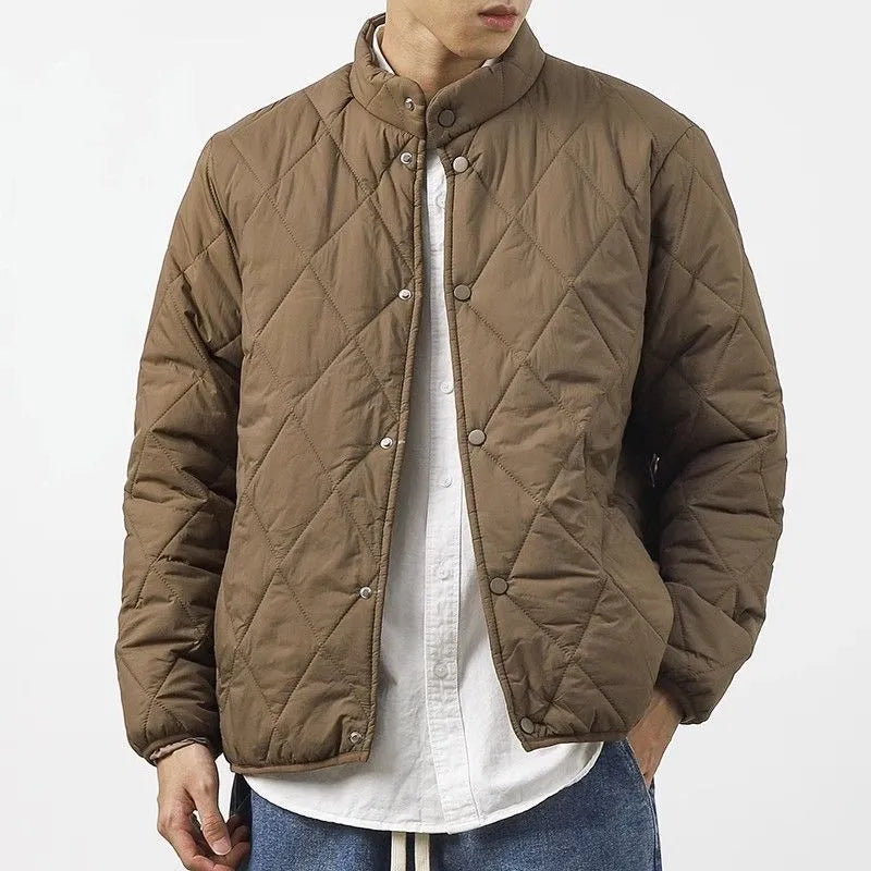 Men's black diamond lattice quilted winter jacket with a long 100cm length and loose fit.