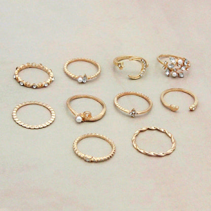 Gold-plated adjustable ring set with moon, star, and leaf charms in a bohemian style