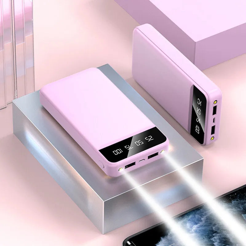 20000 MA power bank in black, white, pink, or blue colours, showing USB ports and compact size.