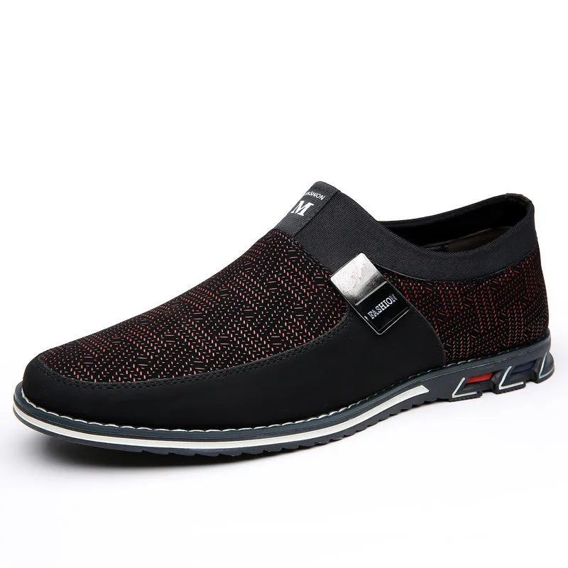 Men's grey and white synthetic leather slip-on casual shoes with a square toe and flat rubber sole.