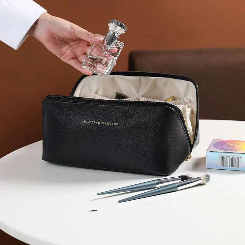 Premium PU leather cosmetic bag with large capacity, versatile storage, and water-resistant design for modern women on the go