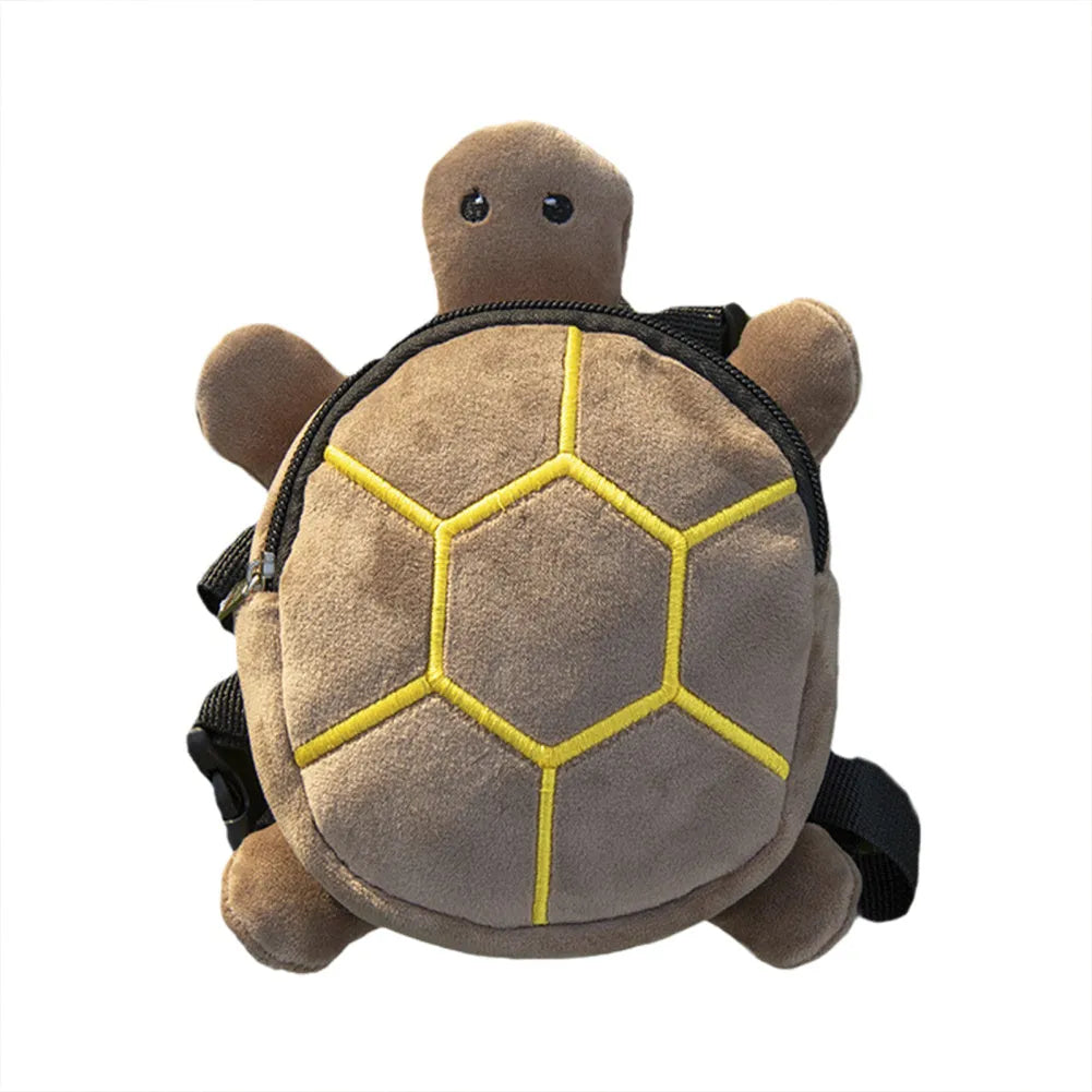 Brown cartoon turtle-shaped dog backpack with no-pull vest harness and metal zipper.