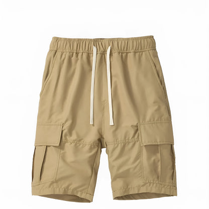 Men's loose cropped pants in Korean style with multiple pockets, shown in brick red colour
