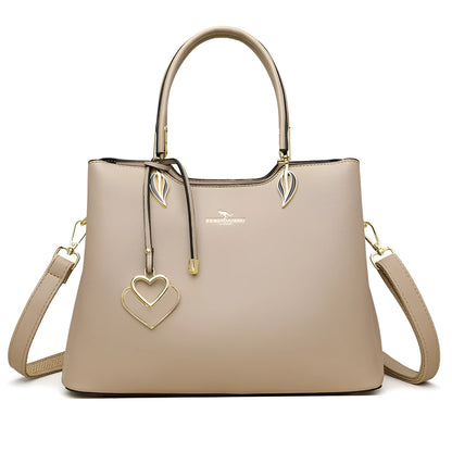 Black women's multi-layer PU leather shoulder messenger bag with sewing thread detail.
