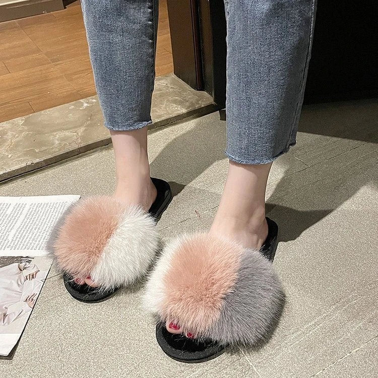 Cosy indoor furry slippers for British women, featuring plush lining, open-toe design, and trendy tassels in a range of classic UK colours.