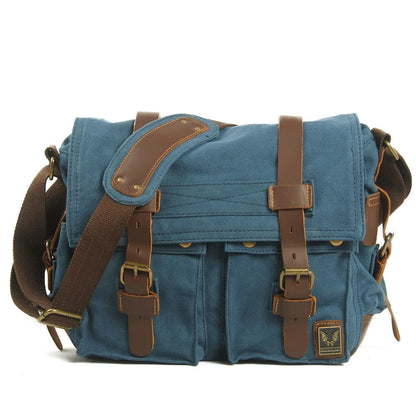 Men's canvas crossbody shoulder bag with cowhide accents and flap closure in retro postman style