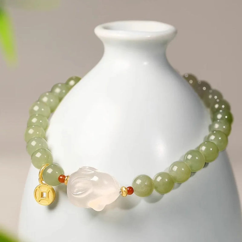 Hetian jade rabbit bracelet for women, handmade glass bracelet with coloured glaze, featuring sweet rabbit animal zodiac charm in jade copper coin, sweet potato rabbit, or Jinsi jade rabbit designs, suitable for gift-giving occasions and female wearers