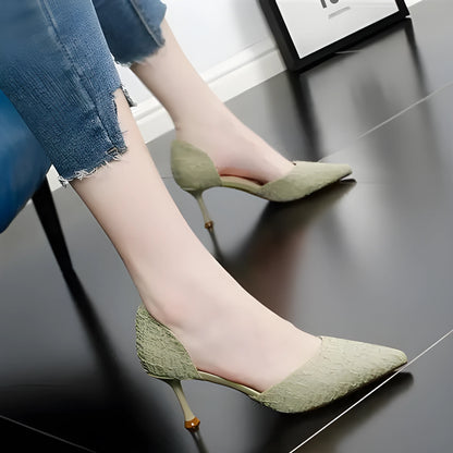 Women's black pointed toe stiletto heel sandals on a white background.