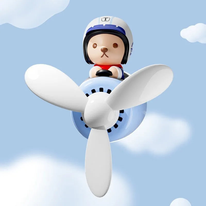 Teddy bear car aromatherapy vent decorative ornament with blue fabric body, plastic perfume holder, and replaceable fragrance tablets for automotive interior air freshening and dashboard decoration