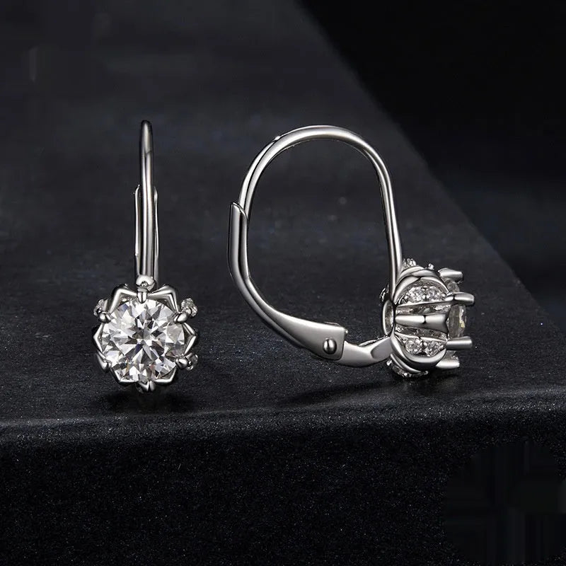 Sterling silver flower bud clip earrings with moissanite and white gold plating