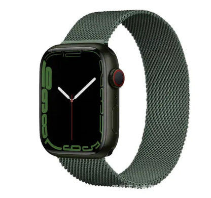 Stainless steel Apple Watch strap in silver on a wrist, showing the metal links and secure clasp.