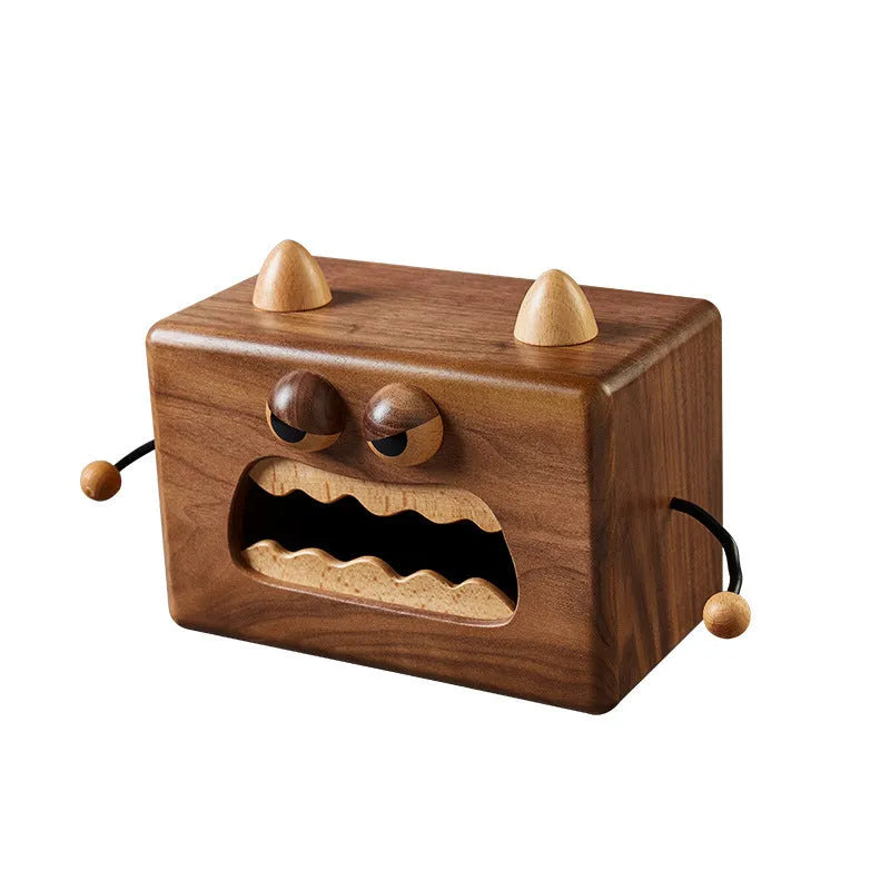 Wooden tissue box with cartoon monster design in walnut and beech colours