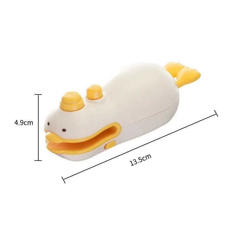 Small yellow duck shaped rechargeable handheld sealing machine with USB cable.