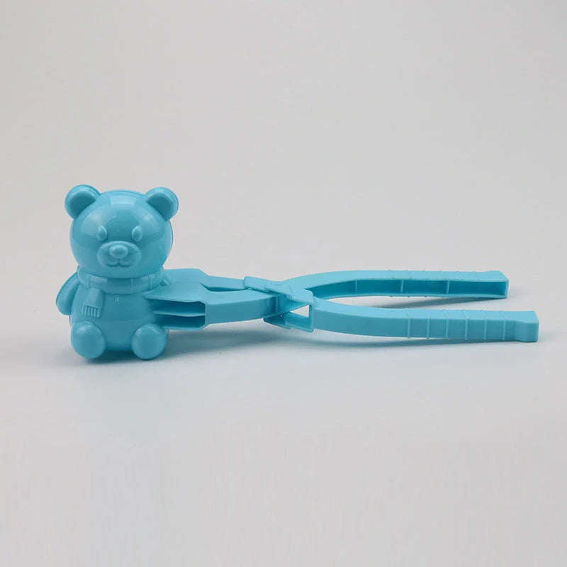 Red heart-shaped snowball maker clip for kids, perfect for winter play