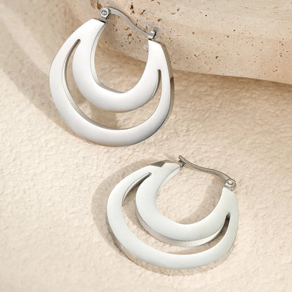 Geometric French earrings with gold plating and round ring design elements