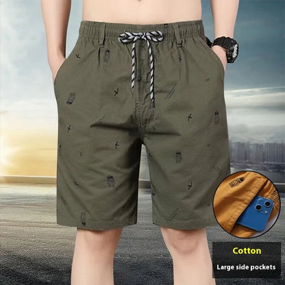 Women's army green loose cropped cotton summer trousers on a white background.