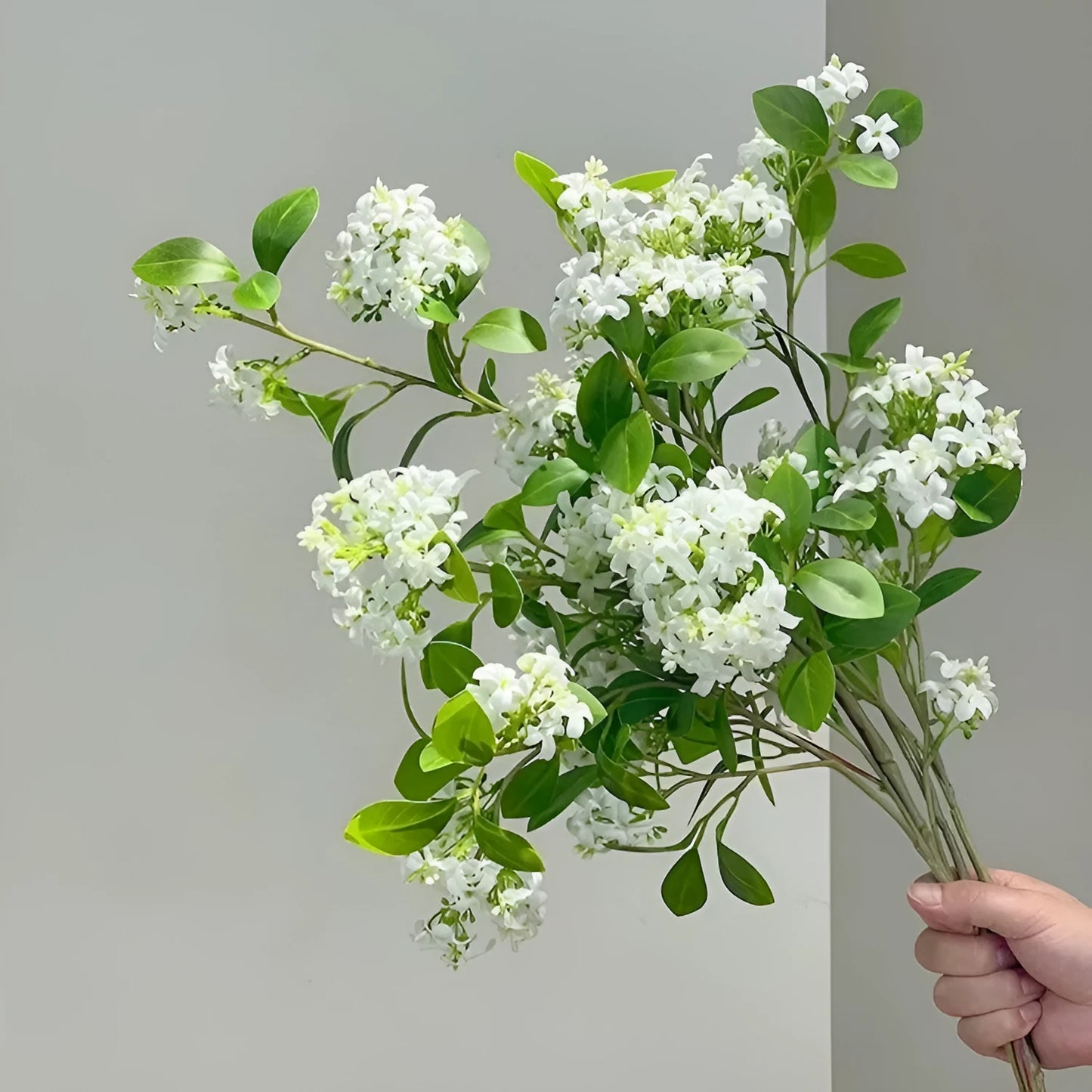 Artificial silk flower decoration in pink, purple, white, or yellow colours for table centrepieces