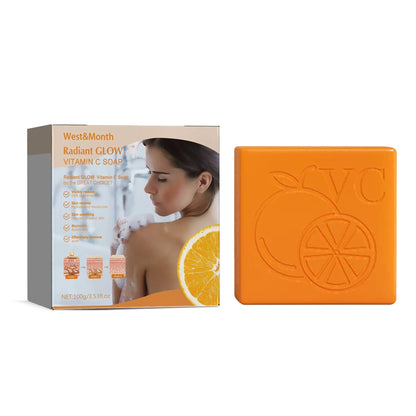 A 100g white bar of whitening soap containing kojic acid and vitamin C for skin brightening.
