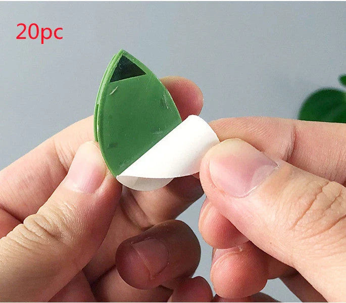 Decorative plant wall clips made of eco-friendly ABS resin in a leaf shape, providing an easy solution for supporting climbing indoor and outdoor plants