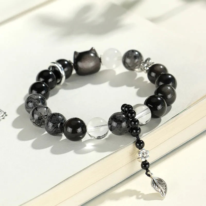 Silver stone crystal beaded bracelet with white, pink and navy blue diamond-cut crystals