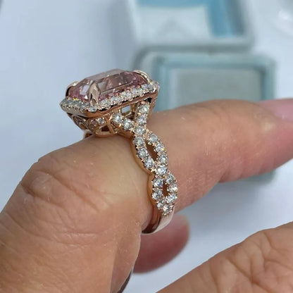 Rose gold geometric alloy ring showing electroplated finish and structured shape.