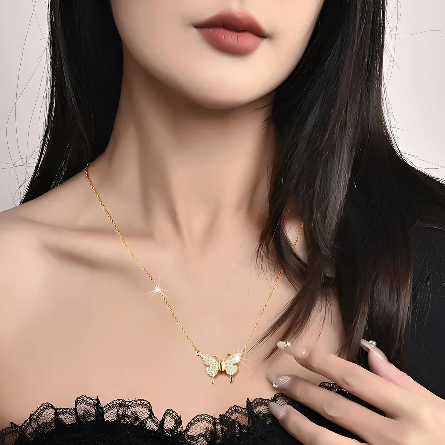 Close-up of a gold titanium steel twisted chain necklace with a magnetic butterfly clasp.