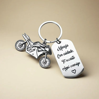 Stainless steel motorcycle-themed keychain with modern design and protective flannel bag