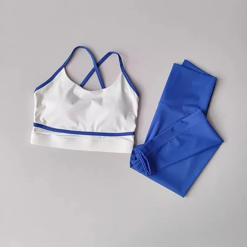 Women's blue and white sleeveless tank top and cropped yoga pants sportswear set