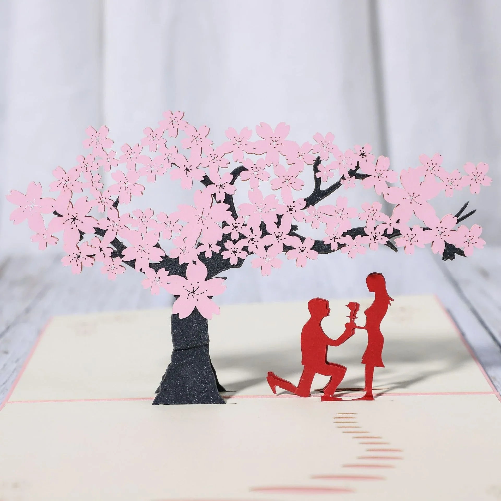 Exquisite 3D pop-up greeting cards for lovers, featuring a variety of romantic motifs like roses, landscapes, and couples.