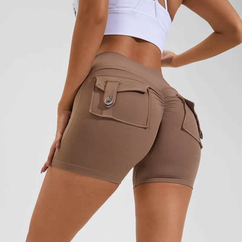 Women's high-waist quick-dry fitness shorts with side pockets in avocado green colour