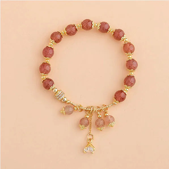 Pink heart-shaped strawberry quartz crystal bracelet with pearl accents for women