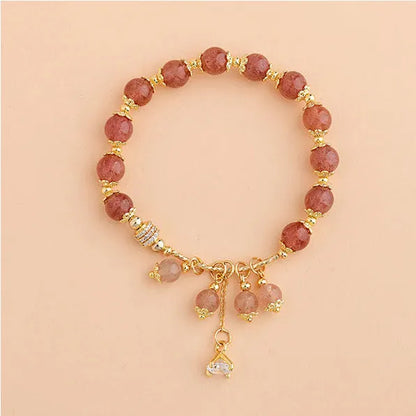 Pink heart-shaped strawberry quartz crystal bracelet with pearl accents for women