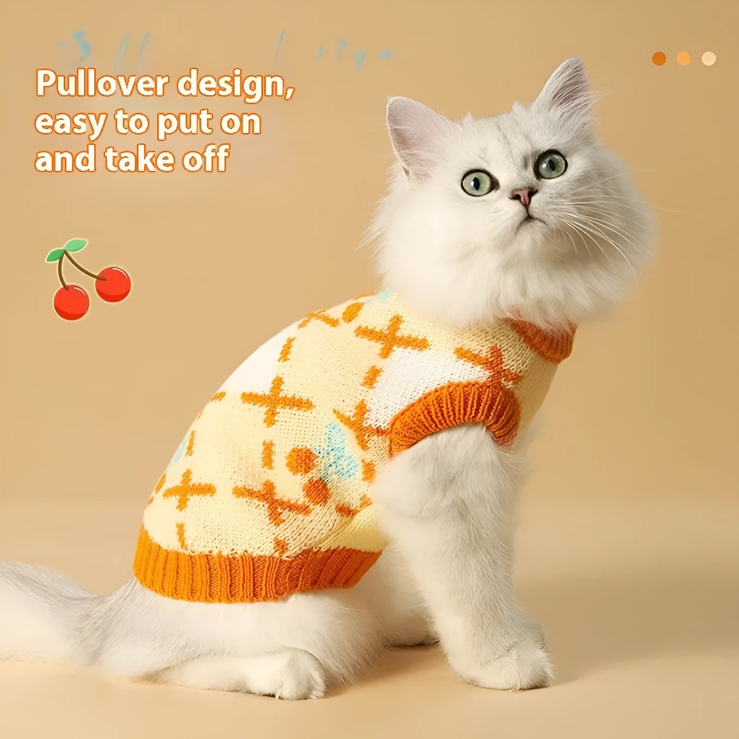Orange cherry diamond pattern cat sweater shown on feline model with size label