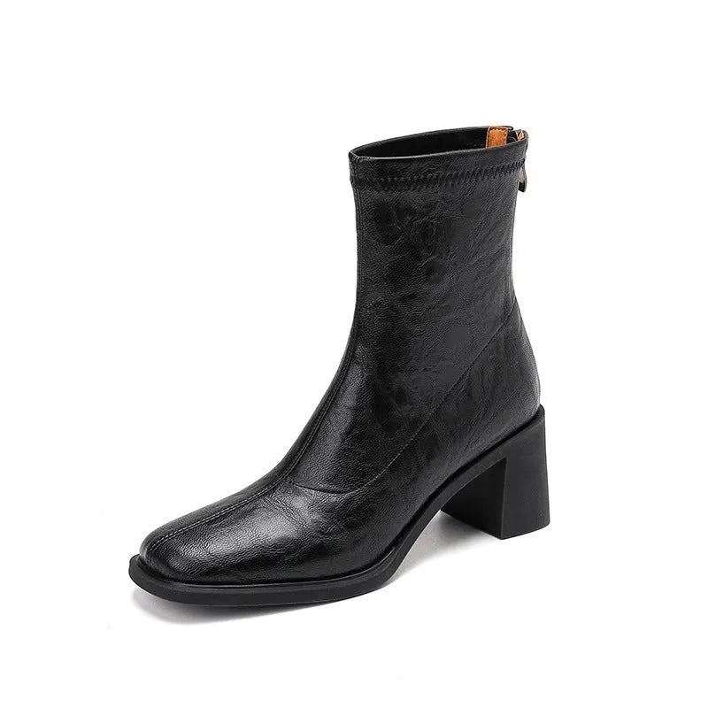 Women's retro ankle boots with chunky mid heel, square toe, back zipper, black microfibre upper, rubber sole.
