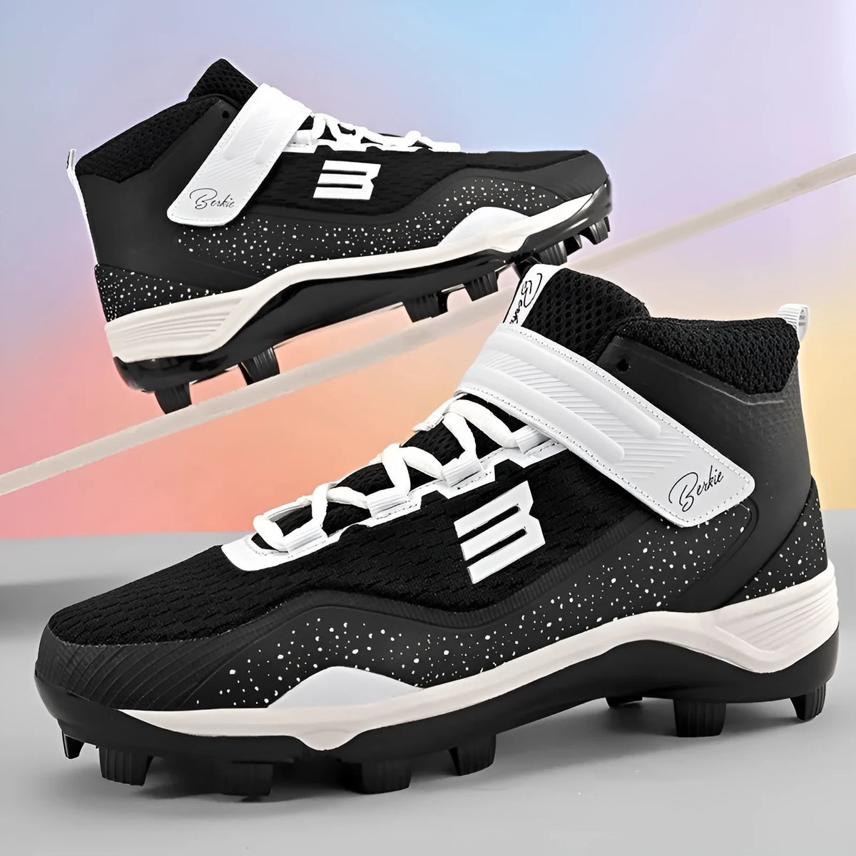 Black and white mid-top baseball sneakers with Velcro strap on a grass surface