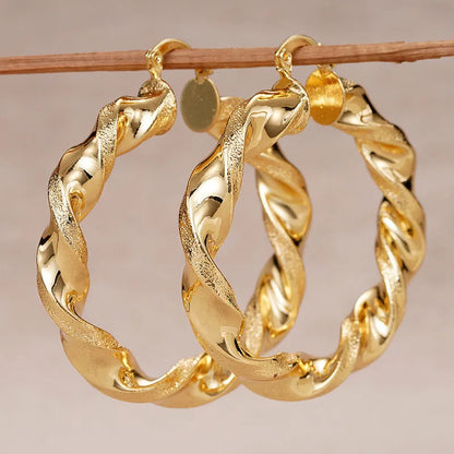 Geometric ring design ear clips for women with drop-shaped copper construction and electroplated finish