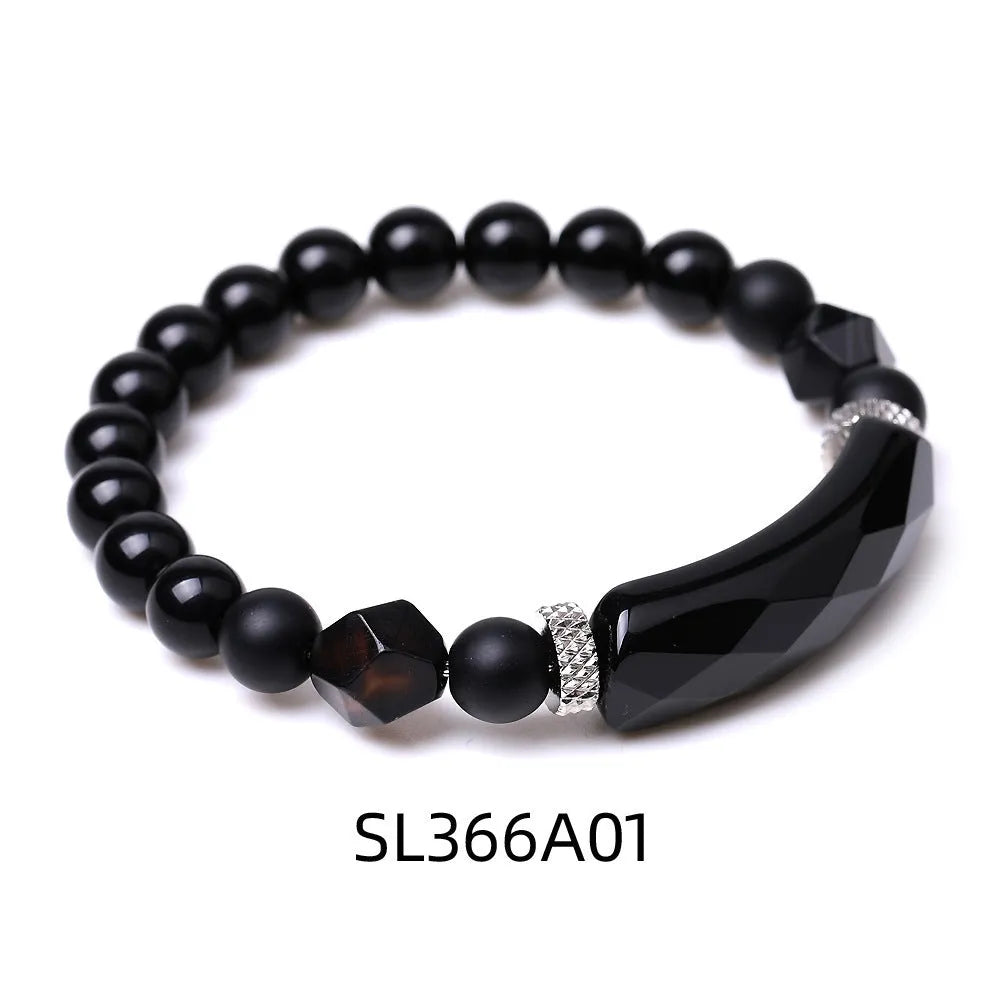 Handmade diamond-shaped cut black agate geometric bracelet showing fan-shaped bead arrangement.