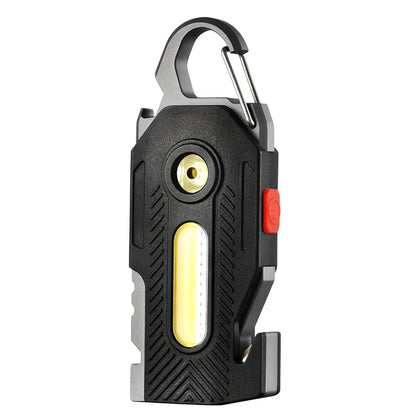 Multifunctional emergency light with mountaineering buckle showing bottle opener and seat belt cutter tools
