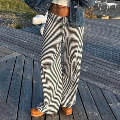 Stylish women's striped wide-leg trousers with lace-up detail in various colors