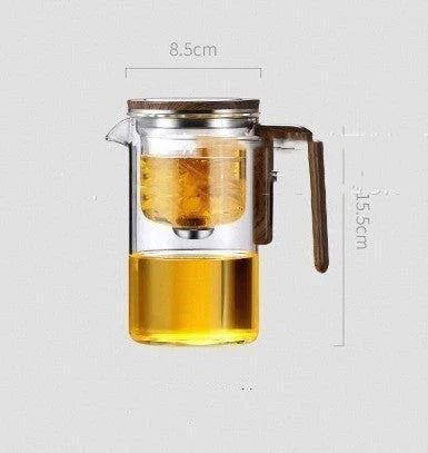 Elegant glass teapot with magnetic water separation filter and wooden handle for brewing and pouring loose leaf tea