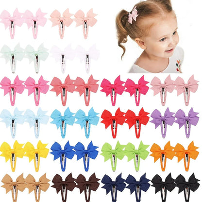 40 assorted colour snap hair bow clips with grosgrain ribbon bows measuring 2 inches wide