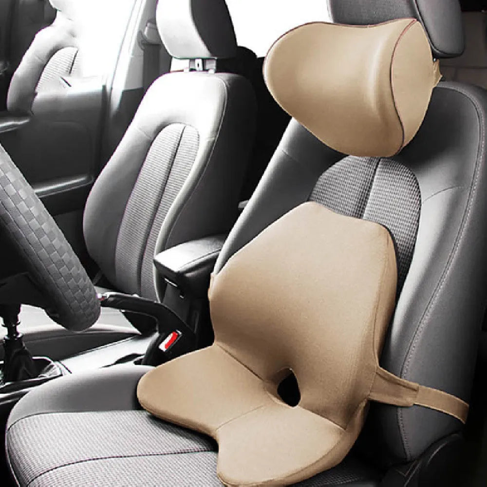 Black memory cotton car seat cushion with lumbar support and integrated headrest on a car seat.