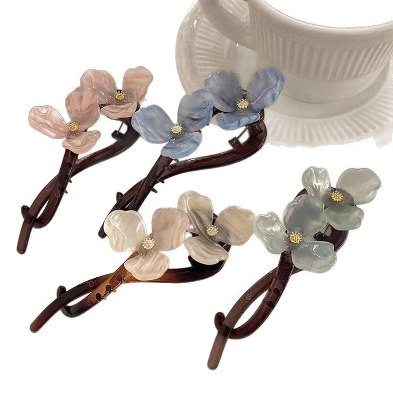 Retro flower bobby pin with acrylic petals in blue, light blue, beige, and pink colour options