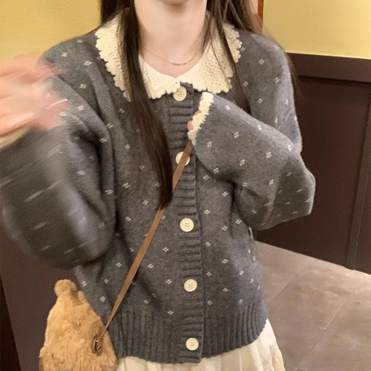 Women's floral pattern knit cardigan with Peter Pan collar in navy blue colour