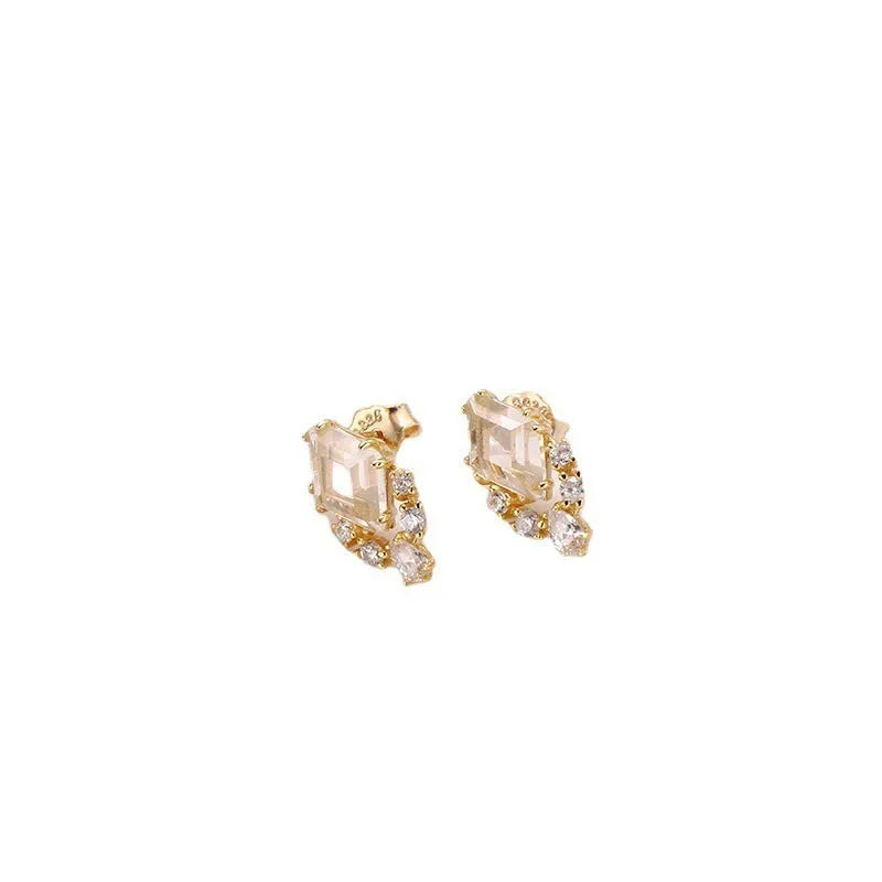 Geometric sterling silver ear studs with sweet white crystal stones