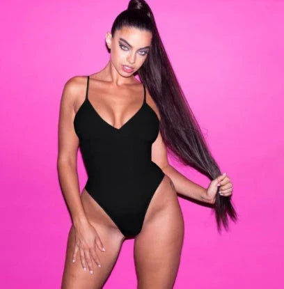 A stylish, backless one-piece swimsuit in a variety of vibrant colors for women's summer fashion.